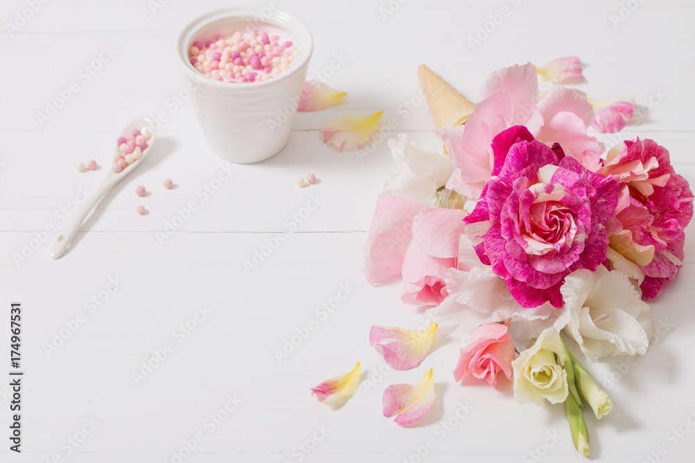 flowers in waffle cone on wooden background flowers in waffle cone on wooden background
