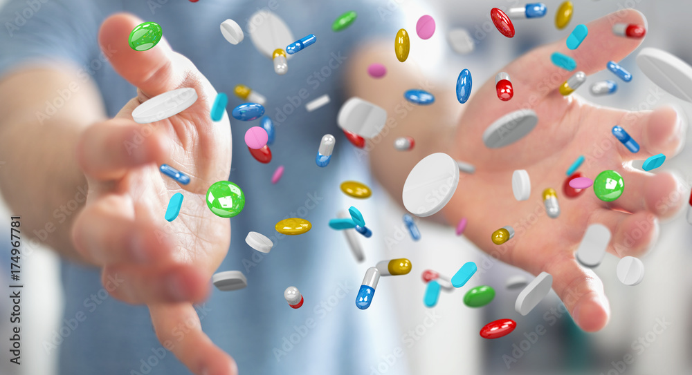 Businessman holding and touching floating medicine pills 3D rendering Businessman holding and touching floating medicine pills 3D rendering