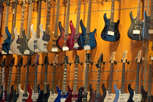 showcase of a music store with guitars