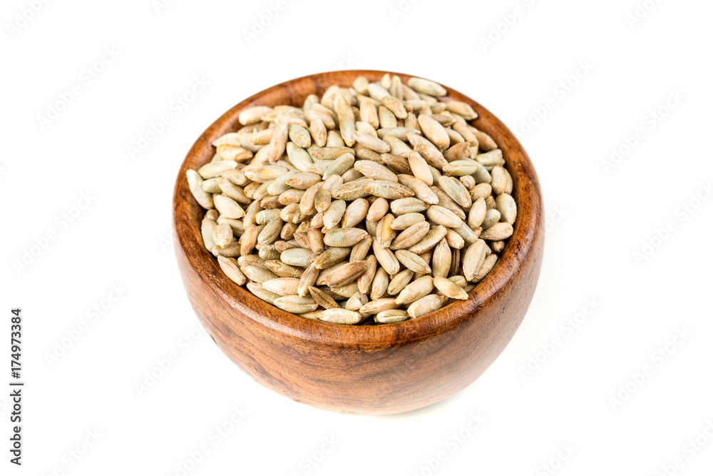 Rye berry grains isolated on a white background
