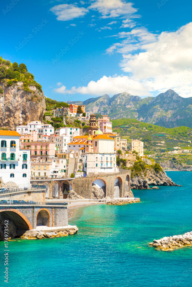 Morning view of Amalfi cityscape on coast line of mediterranean sea, Italy
