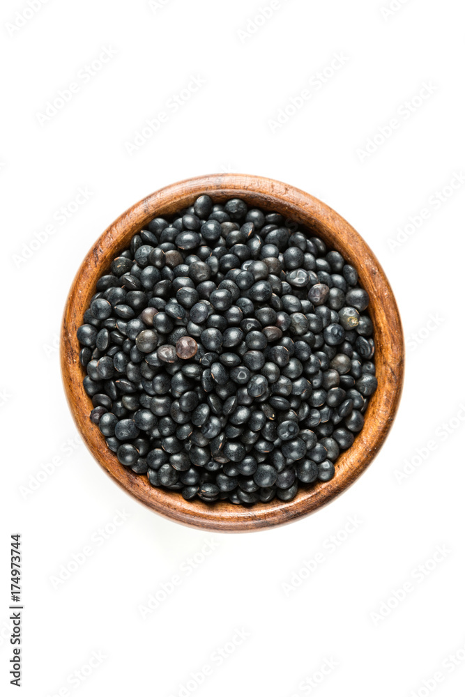 Black beluga lentils isolated on a white background Black beluga lentils isolated on a white background