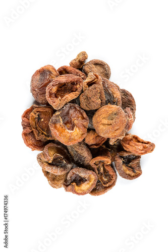 Organic dried apricots isolated on a white background