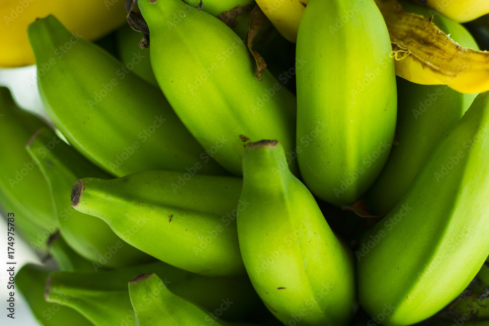 fresh green and yellow bananas ready to eat