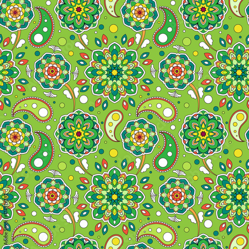 Colorful seamless pattern. Beautiful floral motif. Background in oriental style. The template for printing on fabric. Texture of mandalas on green.