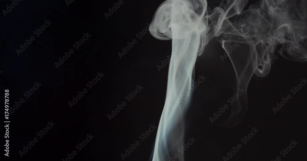 High contrast video of white smoke moving upwards isolated on black High contrast video of white smoke moving upwards isolated on black