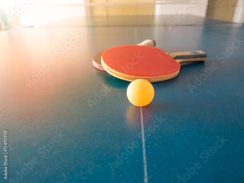 yellow pingpong ball on sport table