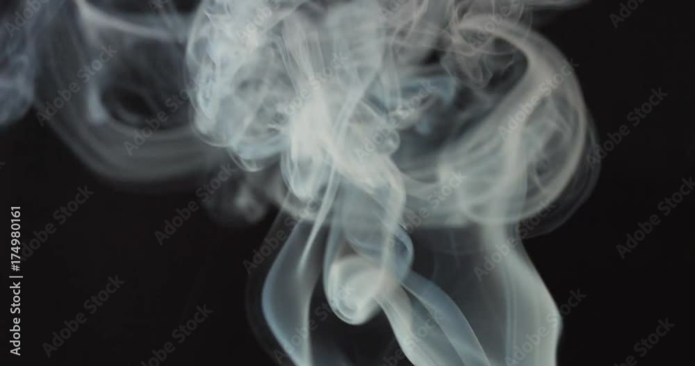 High contrast video of white smoke moving upwards isolated on black High contrast video of white smoke moving upwards isolated on black
