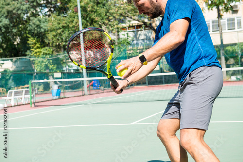 tennis player is training before the match