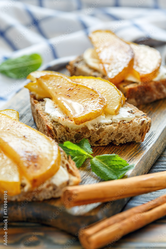 Homemade toasted bread with ricotta, pear and cinnamon. Homemade toasted bread with ricotta, pear and cinnamon.