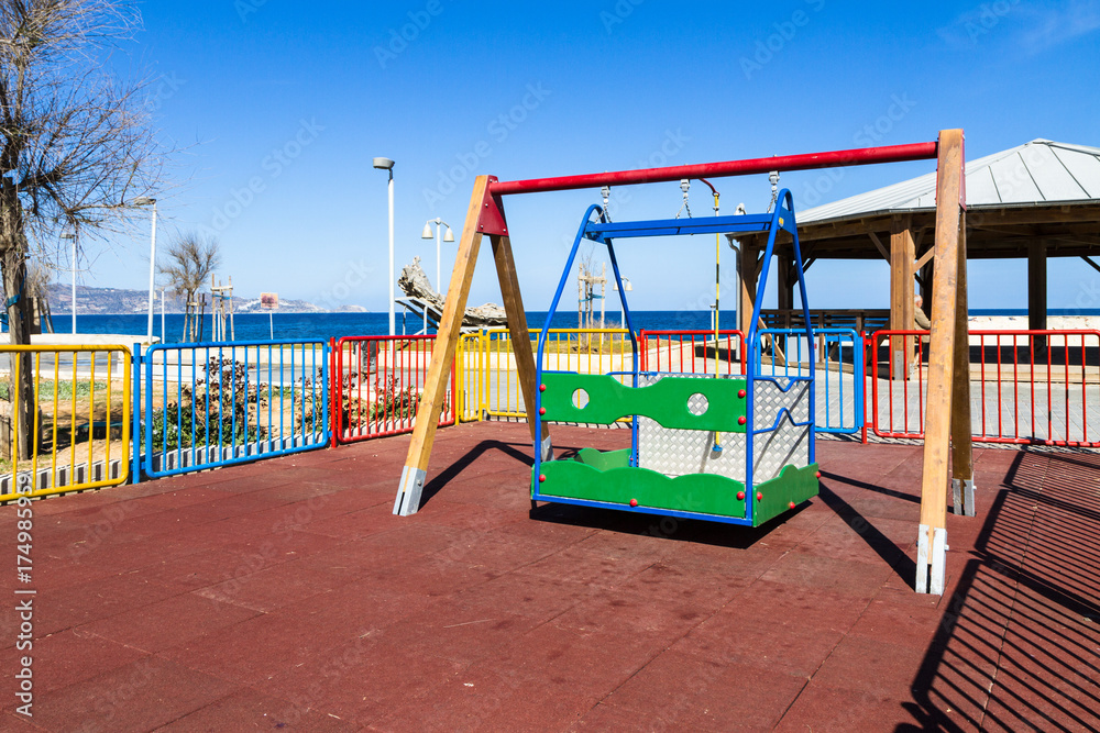 Children's safe wooden playground recreation area at seaside public park Children's safe wooden playground recreation area at seaside public park