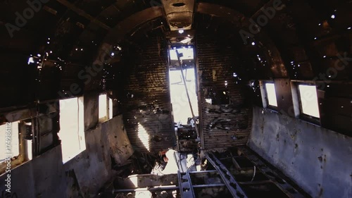 Inside recked plane on a black beach, Iceland photo