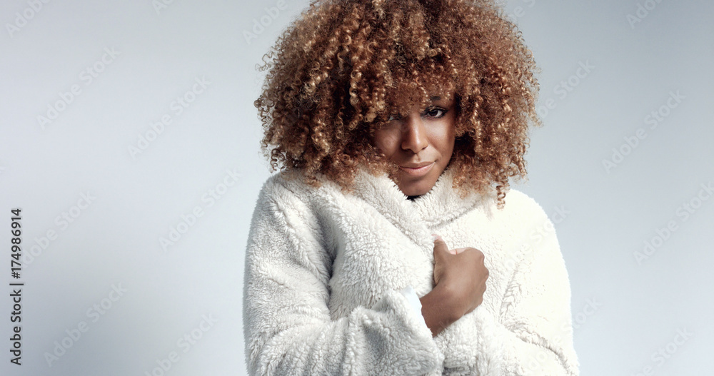 Pretty black girl with big hair posing video. feel freeze. cold season concept Pretty black girl with big hair posing video. feel freeze. cold season concept