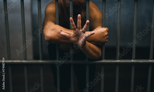 man in jail - People who are blocked are not free,Both thought and body © sutadimages