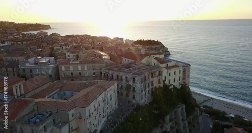 Aerial, drone view of the town Tropea in Calabria. Coast at the evening, sunset time.
