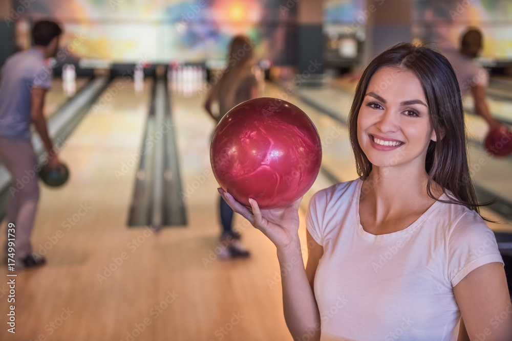 Friends playing bowling Friends playing bowling
