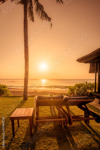 Fototapeta Naklejka Na Ścianę i Meble -  Beautiful sunrise on a beach in Bali Indonesia with colourful sky as background