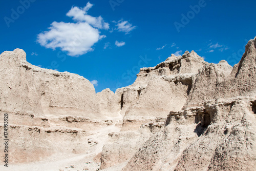 Badlands National Park in South Dakota with blue sky