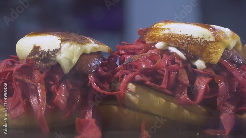 Kumru is a traditional Turkish sandwich on a bun, typically with cheese, tomato, and sausage. Street Food in Izmir Cesme.