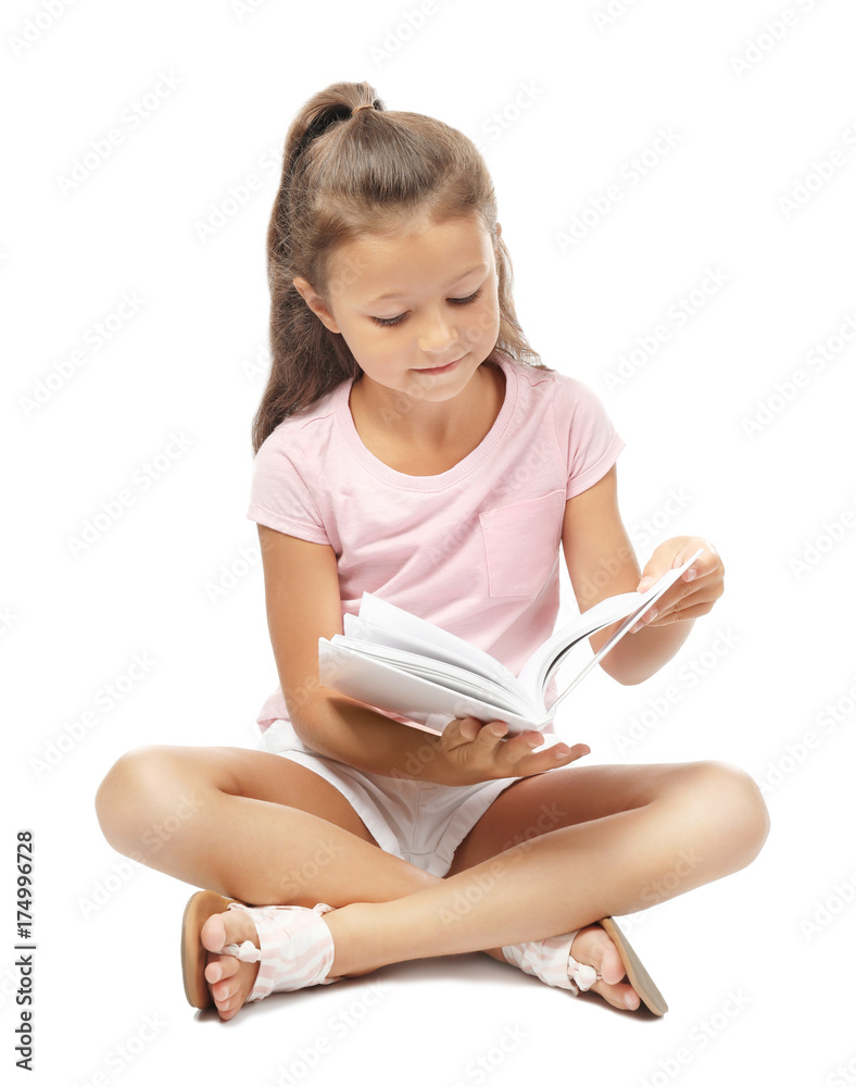 Cute little girl reading book on white background Cute little girl reading book on white background