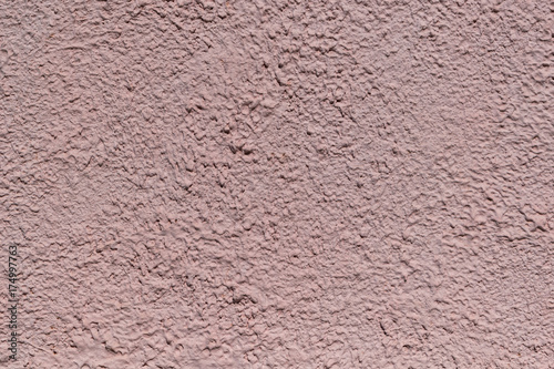 Wallpaper Mural The rough texture of the decorative plaster on the wall. The surface of pink or beige with drips, drops and cracks. There are dimples and bumps. Torontodigital.ca