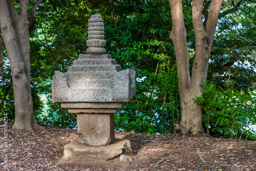 Traditional Japanese stone lantern in the garden, Japan.