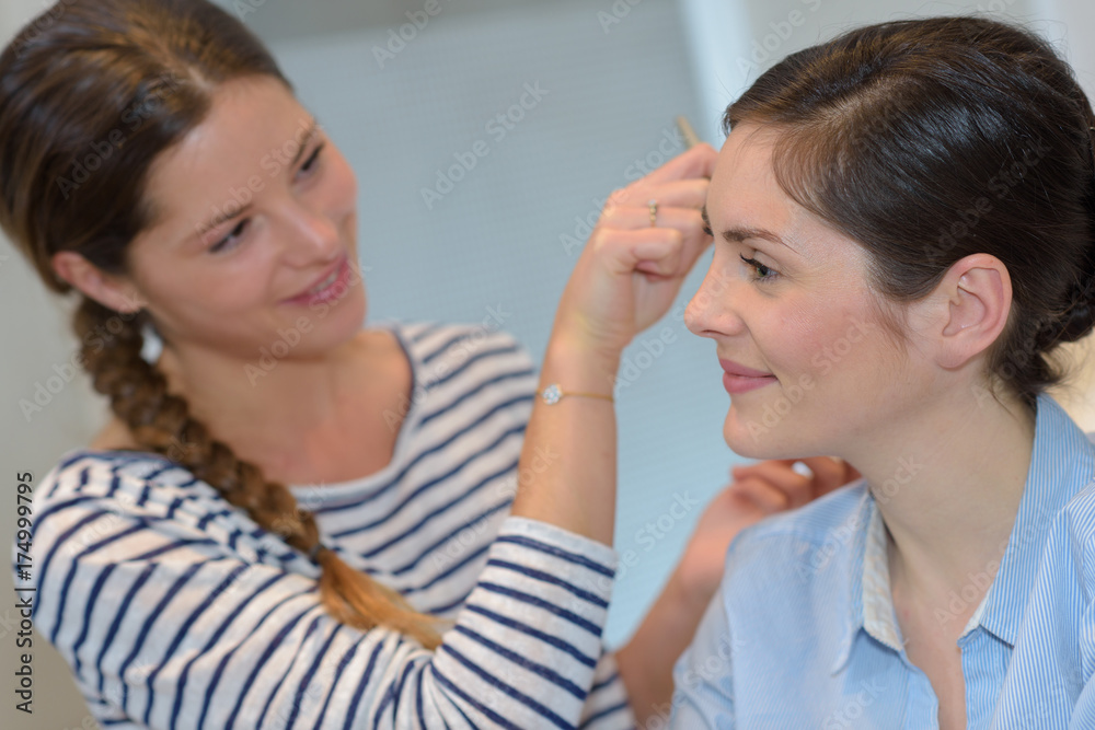 woman beautician doctor with patient in spa wellness center