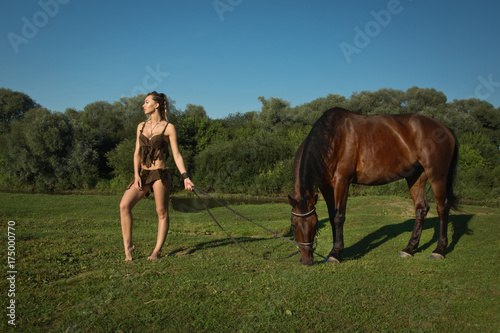 Wild amazon girl on horseback © Demian