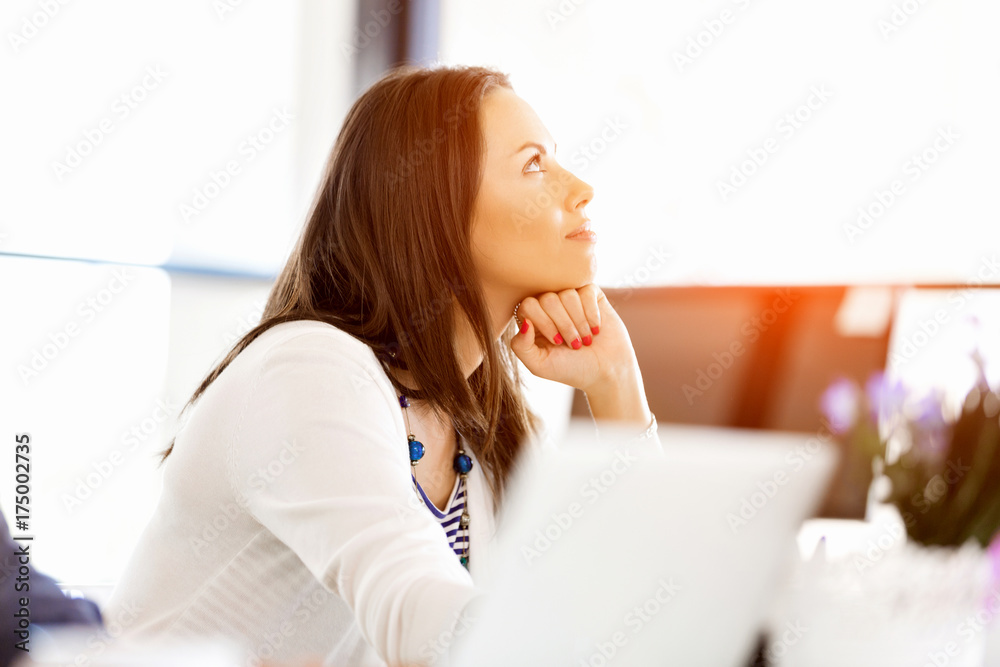 Happy entrepreneur or freelancer in an office or home Happy entrepreneur or freelancer in an office or home