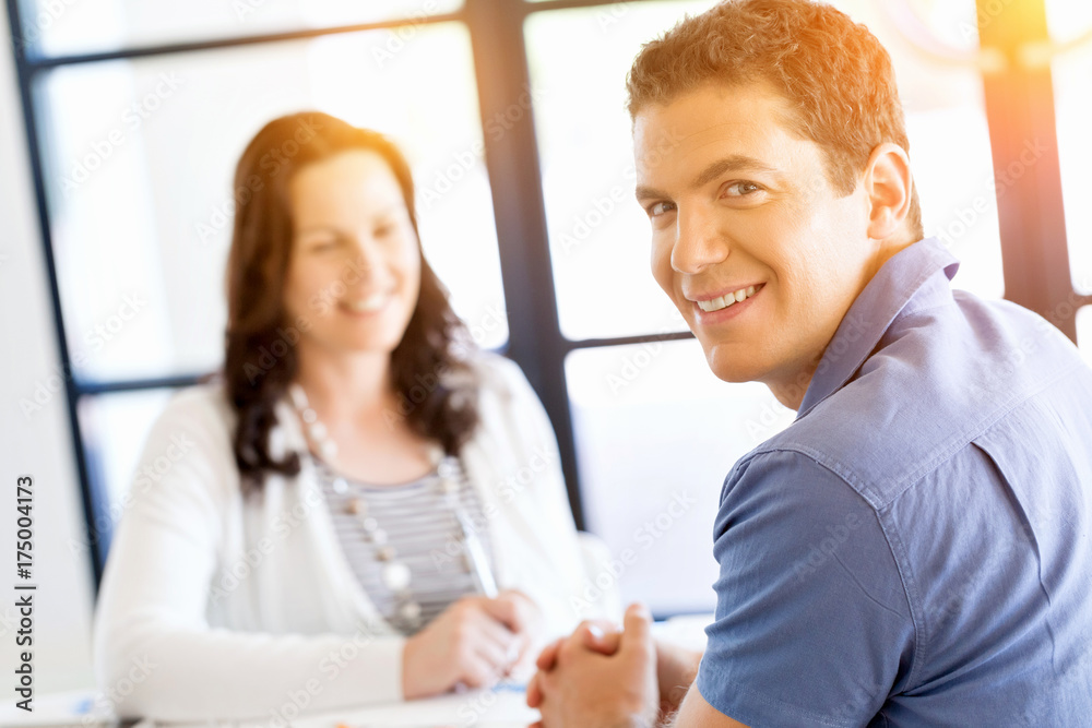 Young man in casual in office