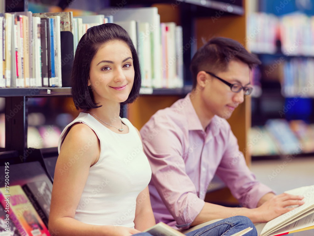 Two young students at the library Two young students at the library
