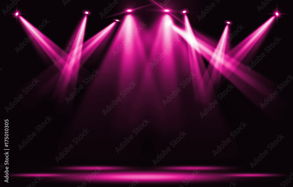 Fotografie Stage lights. Pink violet spotlight strike through the darkness.
