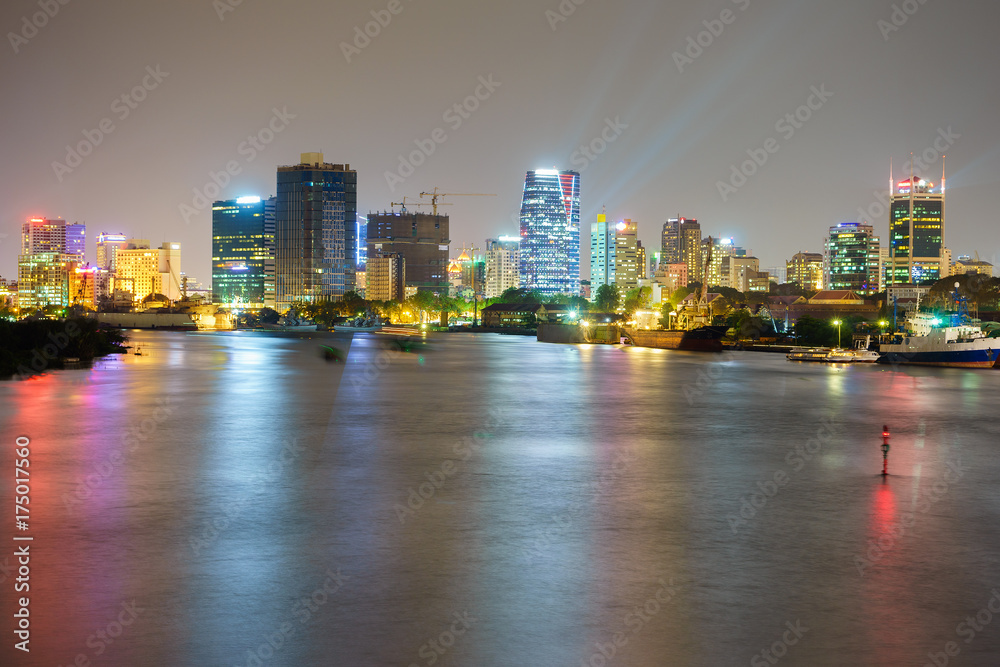 Φωτογραφία Night view of Business and Administrative Center of Ho Chi Minh city on Saigon riverbank in twilight, Vietnam