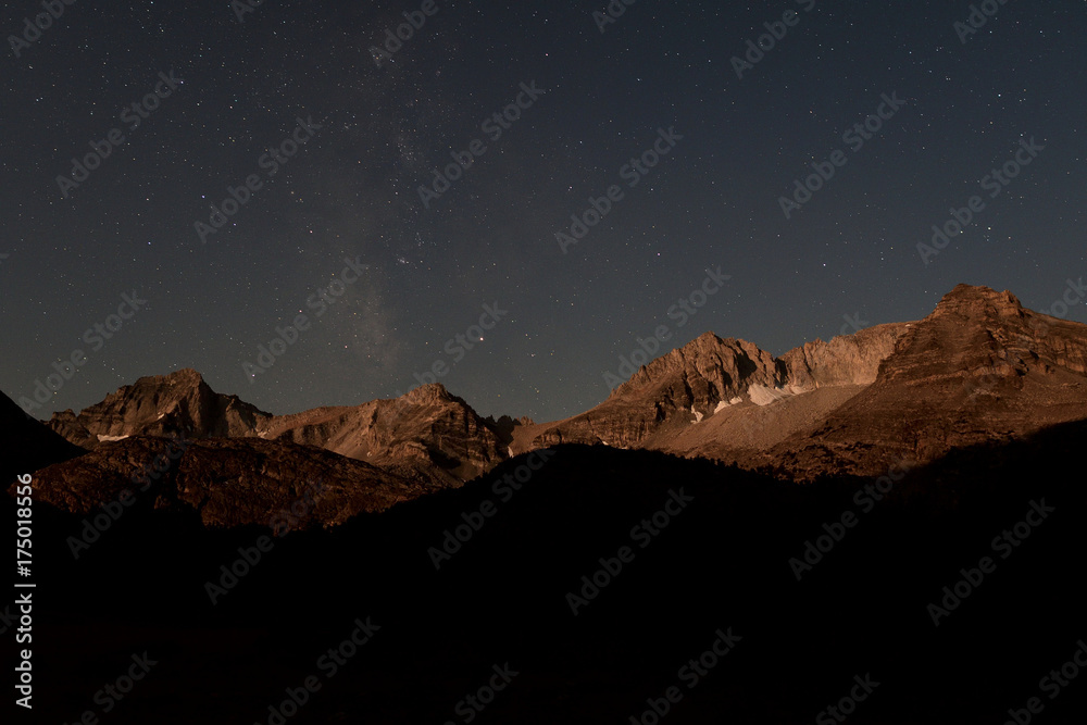 Night photo of eastern Sierra Nevada mountains in Little Lakes Valley.  View of Milky Way and stars.