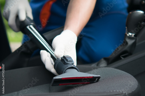 clean and vacuum the car seats, close-up