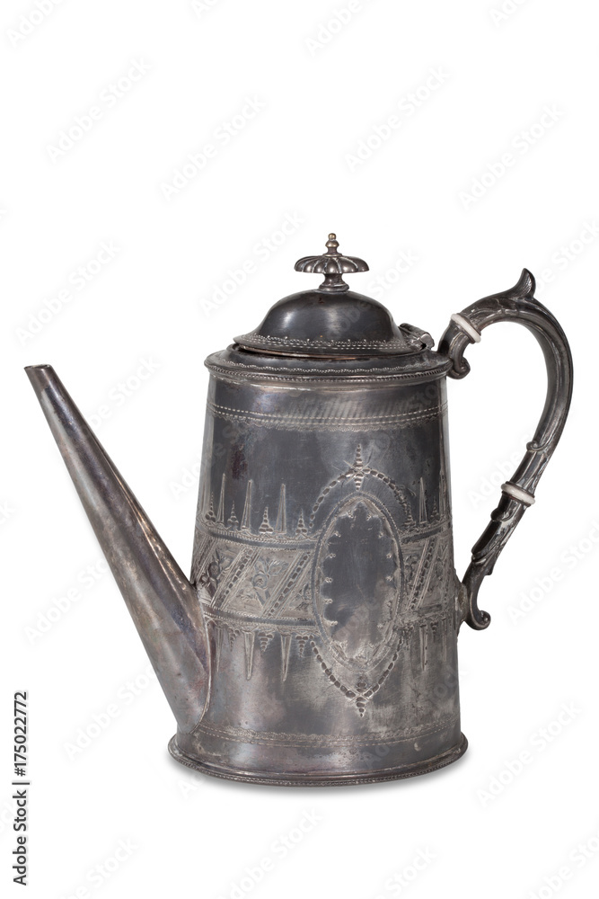 Old metal coffee pot with a lid on a white background