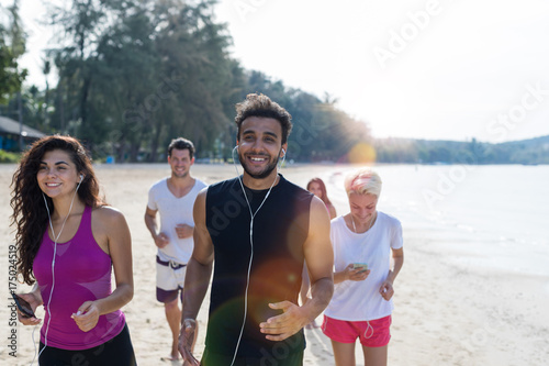 Group Of People Running, Young Sport Runners Jogging On Beach Working Out Smiling Happy, Fit Male And Female Joggers Multiracial Team