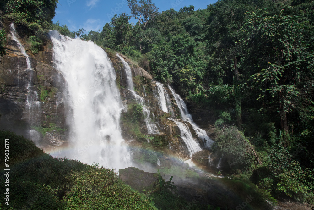 Fototapeta Wachirathan Waterfall With a Rainbow on a Sunny Day, Doi Inthanon National Park, Thailand
