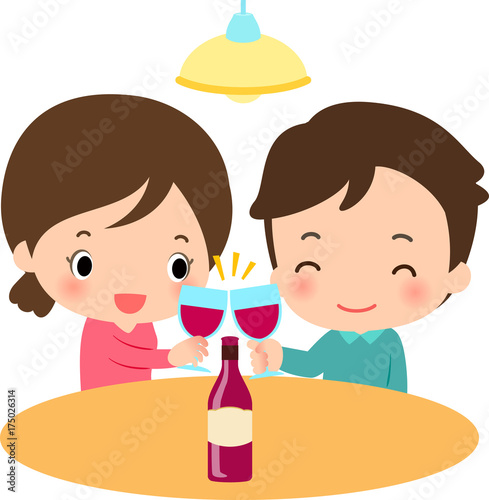 自宅でワインを飲む若い男女