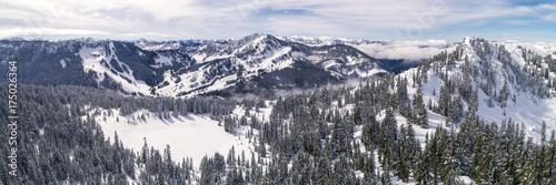 Helicopter Over Winter Mountian Sports Destination in Pacific Northwest Forest