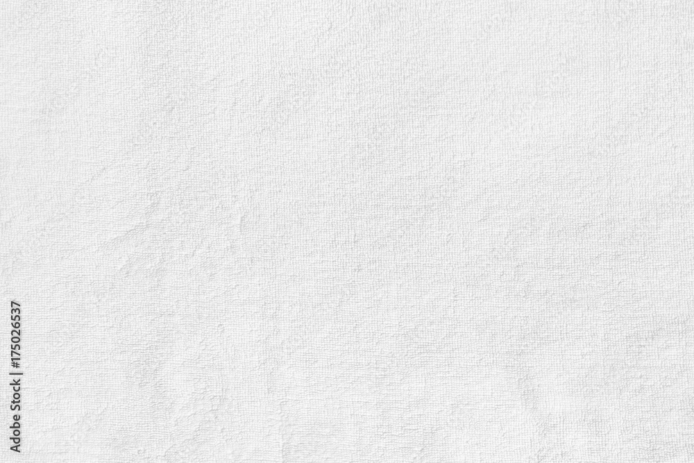 Obraz premium White towel texture for background. Flat and smooth with fabric or textile consist of cotton fiber material. Look plush, fluffy, dry, soft and clean. For background of baby, spa, hotel and laundry.