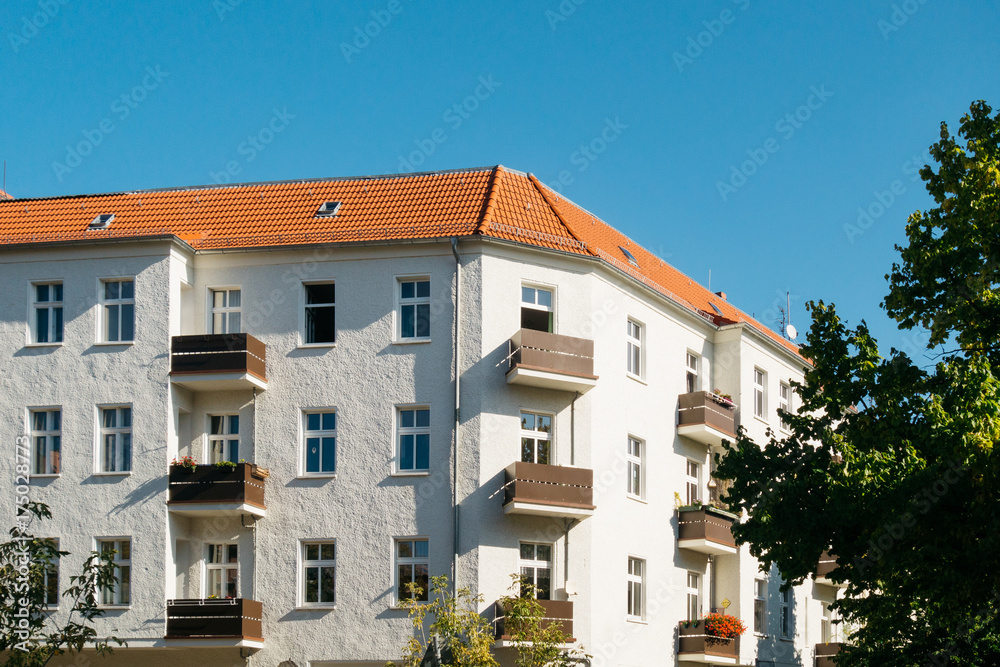 apartment corner building with clean sky