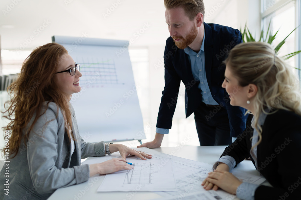 Fototapeta premium Group of architects working together on project