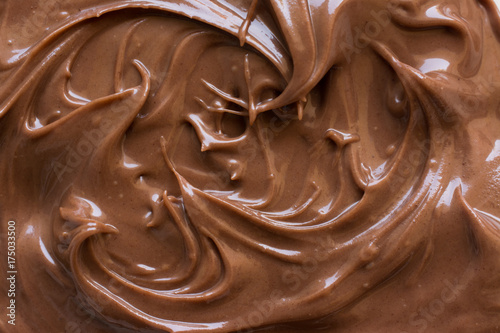 chocolate hazelnut spread on plate. Close up and background