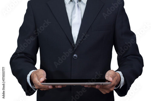 Technology and business concept. Businessman holding digital tablet isolated on white background with clipping path. Young adult working on a digital tablet.