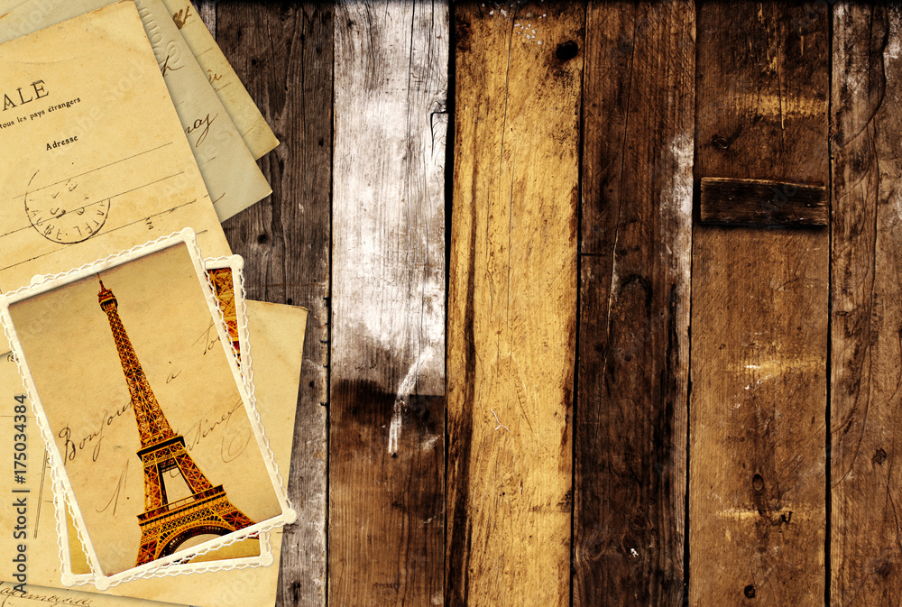 Retro grunge cards with landmarks of Paris on wooden planks Retro grunge cards with landmarks of Paris on wooden planks