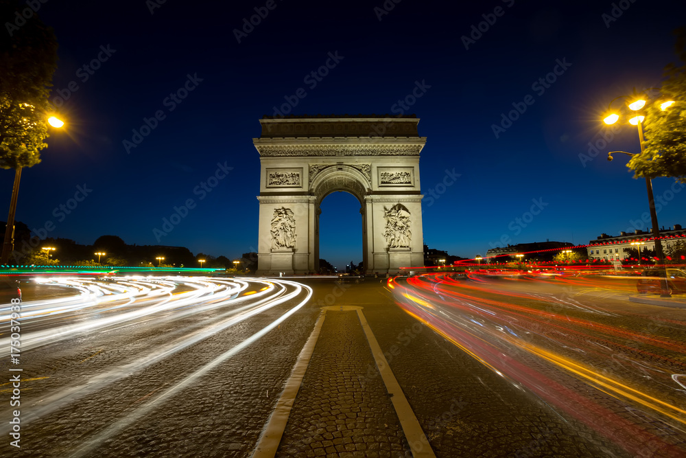 Paris Arc de Triomphe Triumphal Arch at Chaps Elysees at night, Paris, France. Architecture and landmarks of Paris. Postcard of Paris