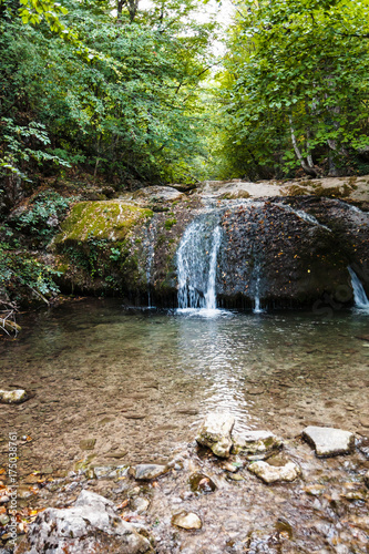 water cascade on Ulu-Uzen river in Haphal Gorge photo