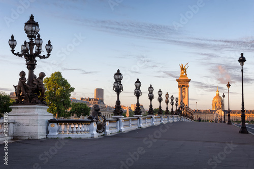 Fototapeta Naklejka Na Ścianę i Meble -  Empty Alexander III bridge in Paris in the early morning, France