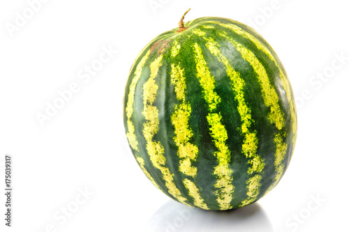 One whole watermelon isolated on white background.